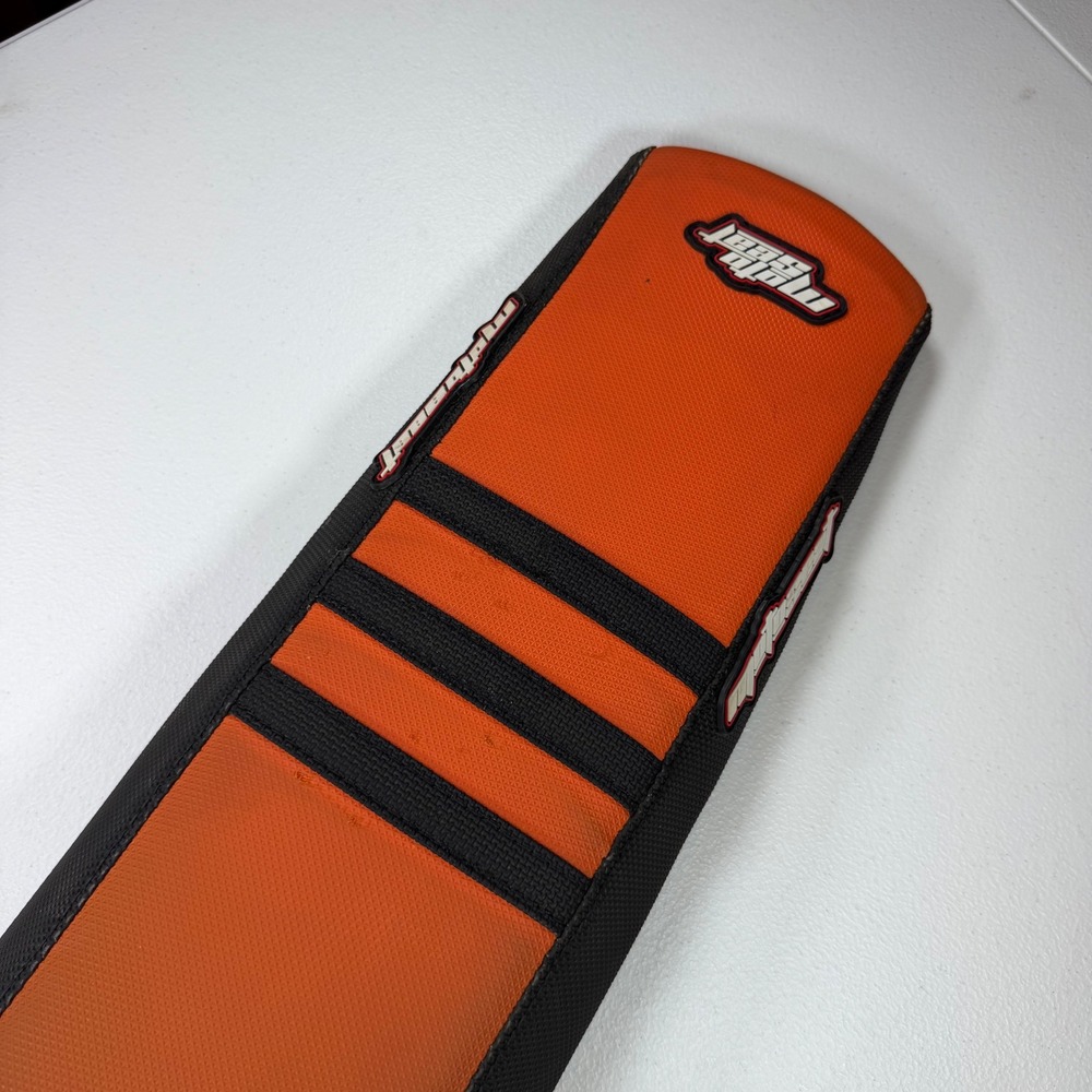 KTM Dirt Bike Seat OS Orange Gripper Ribbed A46007040040 w/ Seat Cover OEM